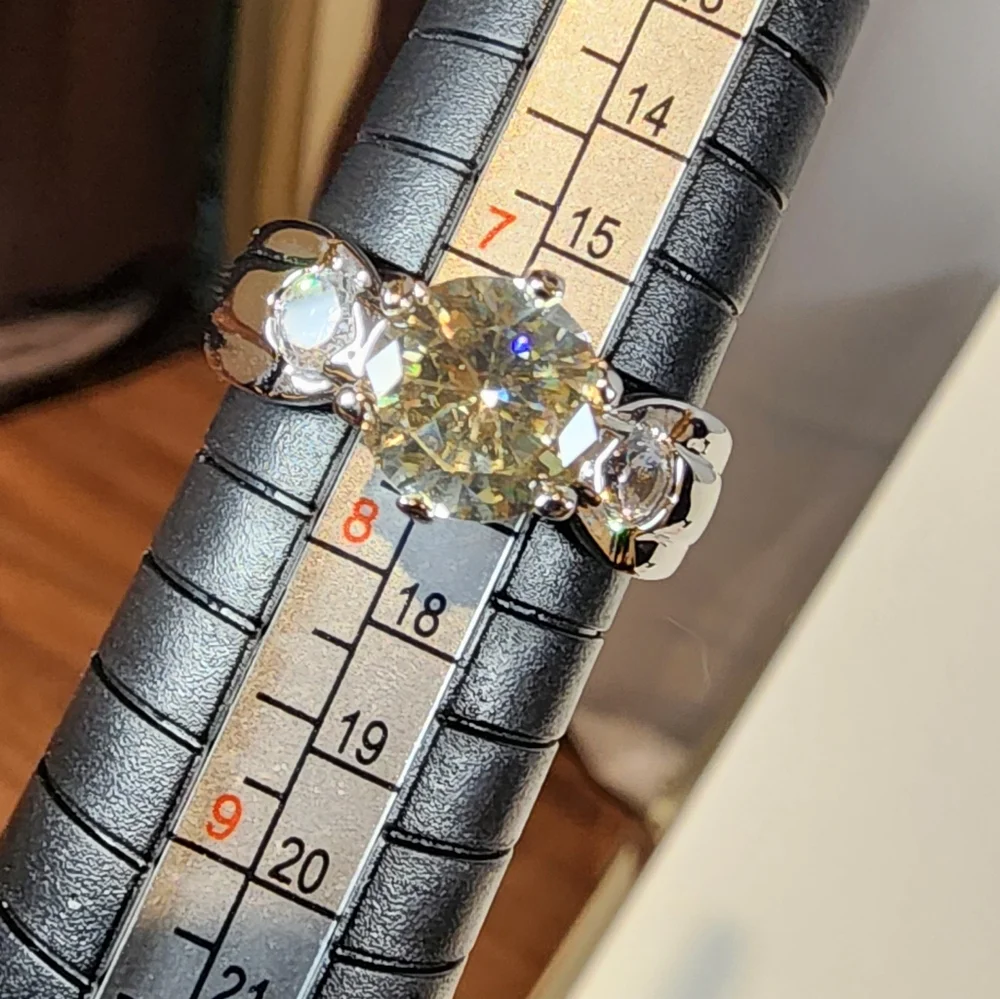 Silver Tone Ring With Large Light Yellow Gemstone
